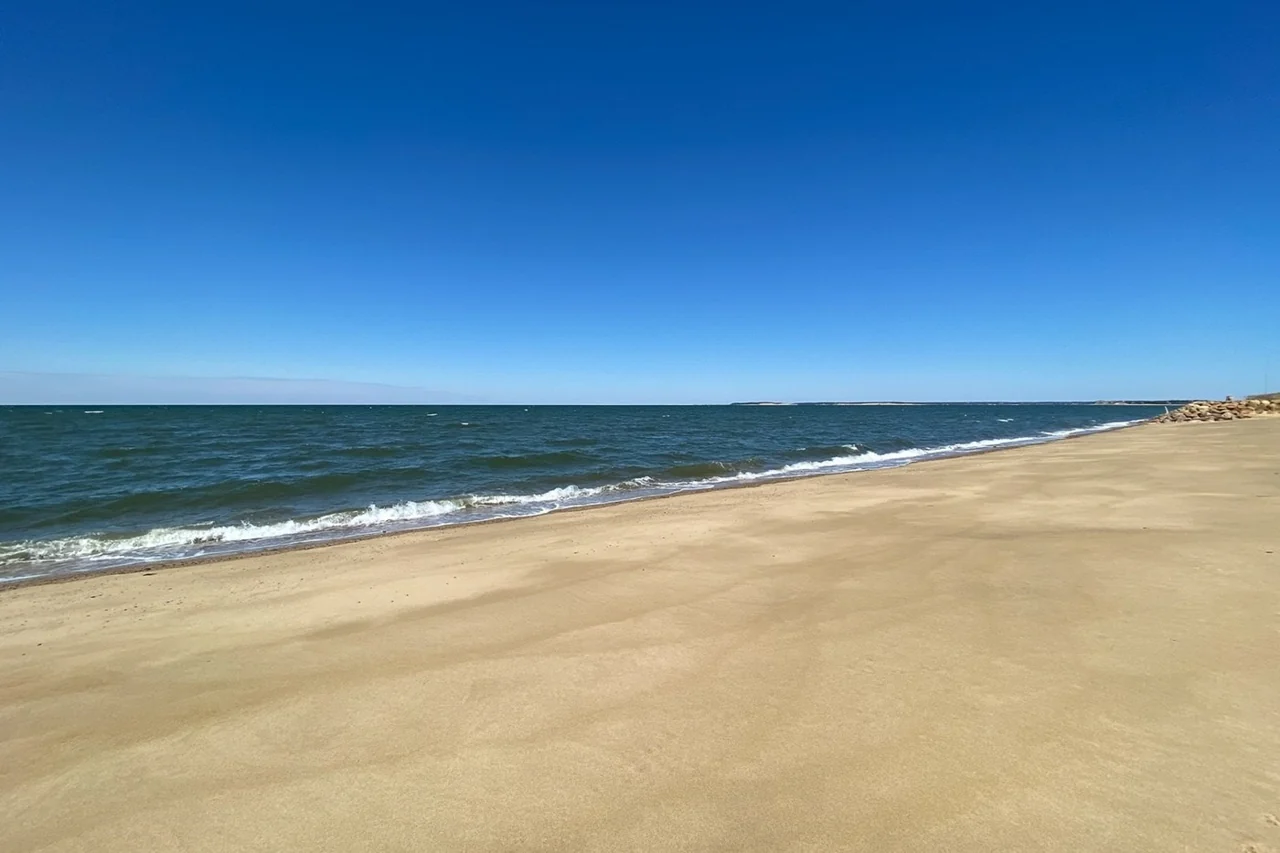 Sandy shore and water at Cape Cod Bay near Eastham