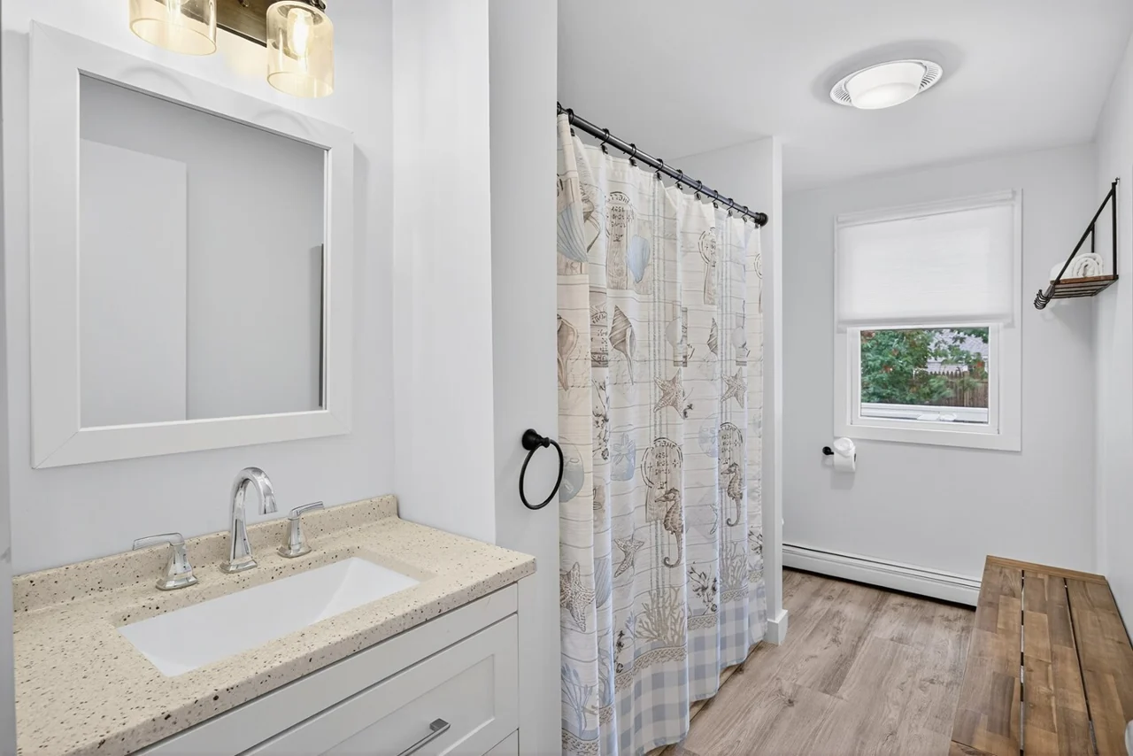 Hall bathroom with a tub and shower