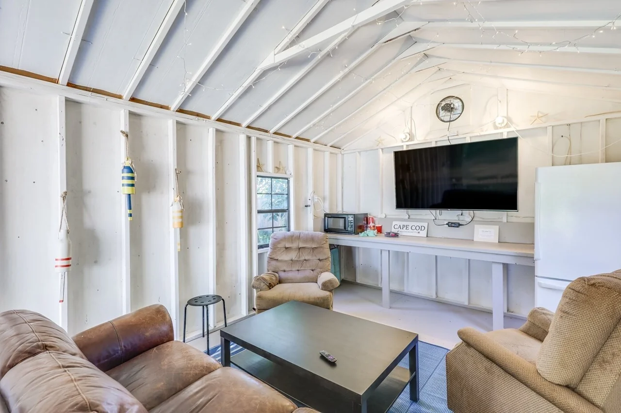 Seating and games in the backyard shed